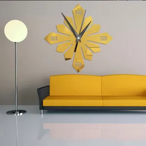Living room wall clock scene display showing modern gold mirror acrylic design details and layout.