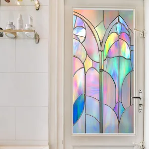 Close-up of colorful static window film on glass door, showing vibrant rainbow light.