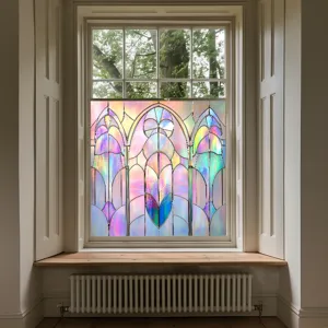 Detailed view of iridescent stained glass window film showcasing prismatic rainbow light effect on window.