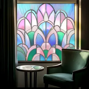 Stained glass window film detail showing vibrant colors and geometric patterns in room.