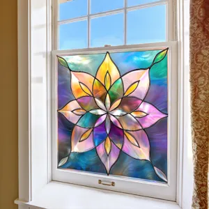 Colorful stained glass window film detail showing vibrant floral mandala design on a bright window.
