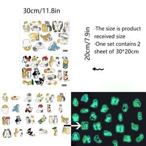 Vue détaillée des stickers muraux chat lumineux montrant l'effet sombre et la disposition.