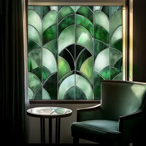 Green Art Deco stained glass window film for home privacy decoration and chic interior style.