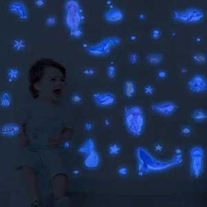 Glow in the dark ocean animal wall stickers, waterproof luminous marine life decals for kids bedroom decor.