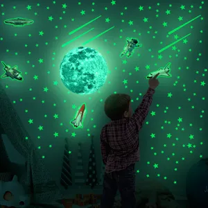 Glow in the dark space wall stickers for kids bedroom decor, stars, moon, and astronaut details.