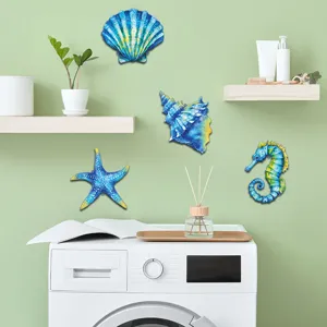 Metal marine life wall hanging detail, blue shell and starfish decor for home wall art.