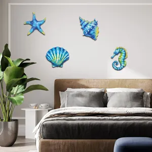 Metal marine life wall decor set featuring starfish, shell and seahorse for home interior.