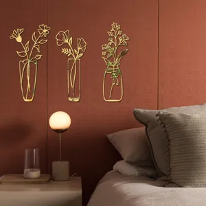 Close-up scene of 3d gold floral acrylic mirror wall stickers in cozy bedroom decor.