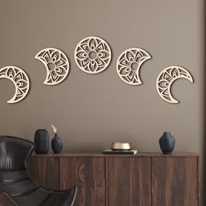 Detailed view of the 3D hollow wooden moon phase wall hanging decor in a modern interior setting.