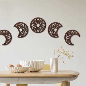 Wooden moon phase wall hanging set, boho 3D hollow wood moon cycle art for home room decor.