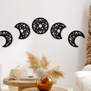 Wooden moon phase wall hanging with detailed hollow carved moon cycle for home decor.
