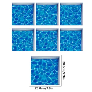 Detailed view of square anti-slip bathtub stickers with blue water ripple pattern, 20x20cm.