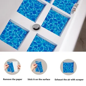 Anti-slip bathtub stickers with blue water pattern, frosted surface for safety in bathroom.