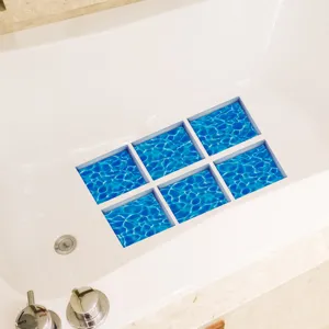 Non-slip bathtub stickers with blue water ripple design, waterproof frosted safety strips for tub.