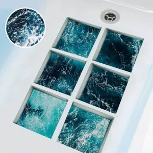 Detail image of non-slip bathtub stickers with blue ocean wave patterns for bathroom safety