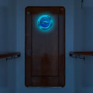 Luminous porthole wall sticker with shark design, glowing fake window decor for home room.