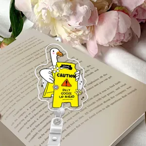 Cute silly goose badge reel close-up, funny retractable ID card holder detail for office or school use.