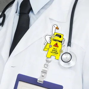 Cute silly goose badge reel detail shot, showing the funny warning sign and doctor coat view.
