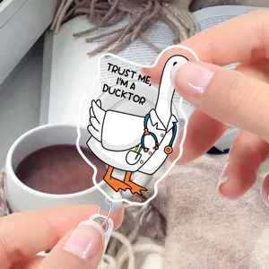 Cute duck doctor badge reel close-up view, funny ID card holder for office and daily use.