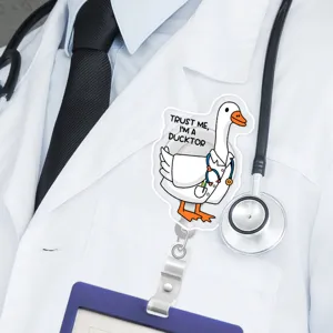 Doctor silly goose badge reel detail view, cute animal ID card holder with retractable clip.