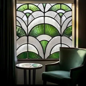 Detailed scene of green and white stained glass window film, elegant art deco pattern.