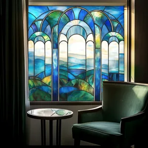 Detailed view of stained glass window film showcasing scenic blue arch design in room setting.