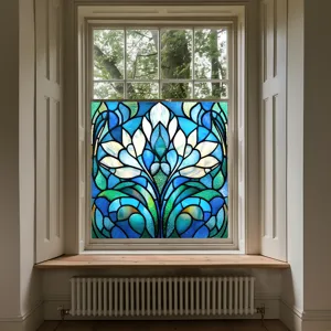 Decorative stained glass window film with vibrant blue floral pattern, static cling design.