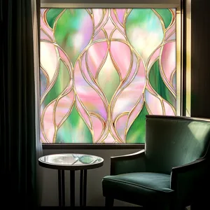 Detailed view of colorful stained glass window film creating elegant light and shadow effects.
