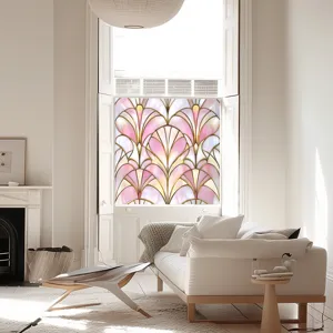 Close-up scene of pink and gold art deco stained glass window film in a bright modern room.