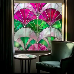 Detail view of decorative stained glass window film showcasing vibrant pink and green art deco art.