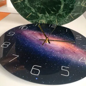 Creative minimalist acrylic wall clock with galaxy and marble UV print design for home decor.