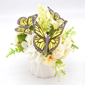 3D holle vlinder muurstickers en kunstmatige bloemen decoratie voor thuis en feest.