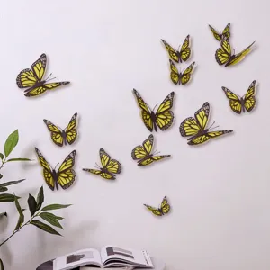 Close-up detail van 3D holle vlinder muurstickers, levendig geel ontwerp voor huisdecoratie in kamer.