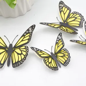 Gedetailleerd uitzicht van 3D vlinder muurstickers van parelmoer papier, ideaal voor decor.
