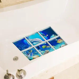 Detail view of anti-slip bathtub stickers with ocean dolphin designs for secure bathroom safety.