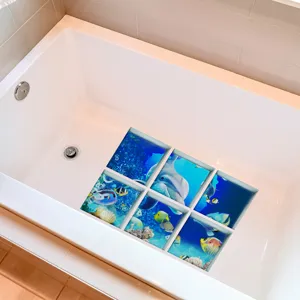 Detail view of anti-slip bathtub stickers featuring ocean dolphin patterns, safe for daily home use.