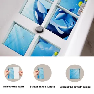 Detailed closeup view of ocean whale bathtub anti-slip stickers with step installation guides.