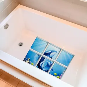 Ocean whale non-slip bathtub stickers showcased neatly inside a modern white tub.
