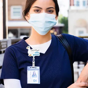 Nurse silly goose badge reel detail shot, cute duck retractable ID card holder for daily use.