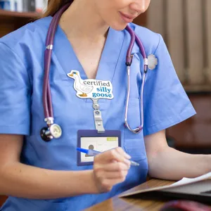 Cute cartoon duck badge reel and ID card holder set for nurses, doctors, and students.