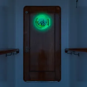 Glow in the dark marine animal porthole sticker detail scene showing night luminous effect on door.