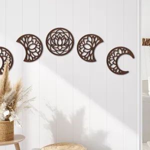 Detailed view of the 3D hollow wooden moon phases wall hanging decor, elegant home art piece.
