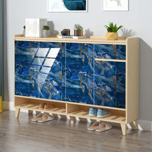 Armoire à chaussures en bois moderne avec motif marbre bleu élégant pour la décoration.
