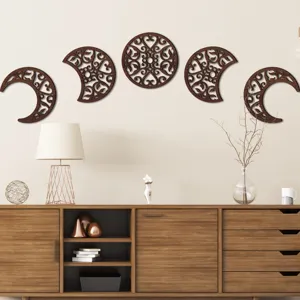 Detailed view of wooden phase of the moon wall art, hollow carved wall hanging decor.