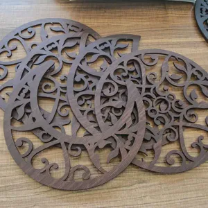 Wooden moon phase hollow wall decor detail shot, exquisite carving craft for home wall hangings.