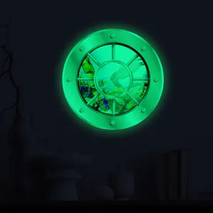 Glow in the dark porthole wall sticker featuring an underwater sea world design for kids room decor.