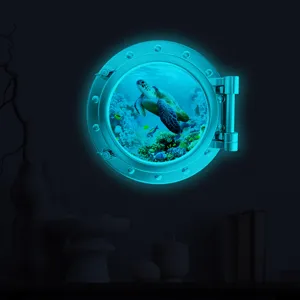 Luminous porthole wall sticker featuring ocean sea turtle design for kids room decoration.