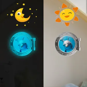 Luminous dolphin porthole wall sticker detail, glowing in dark for kids bedroom decor.