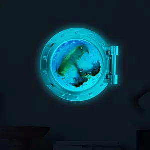 Luminous round porthole wall sticker showing a glowing jellyfish scene for kids room detail.