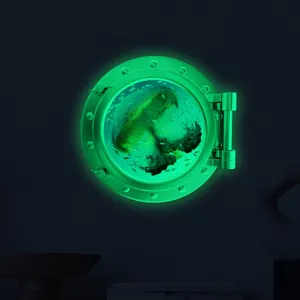 Glow in the dark porthole wall sticker, marine jellyfish design for kids room decor.